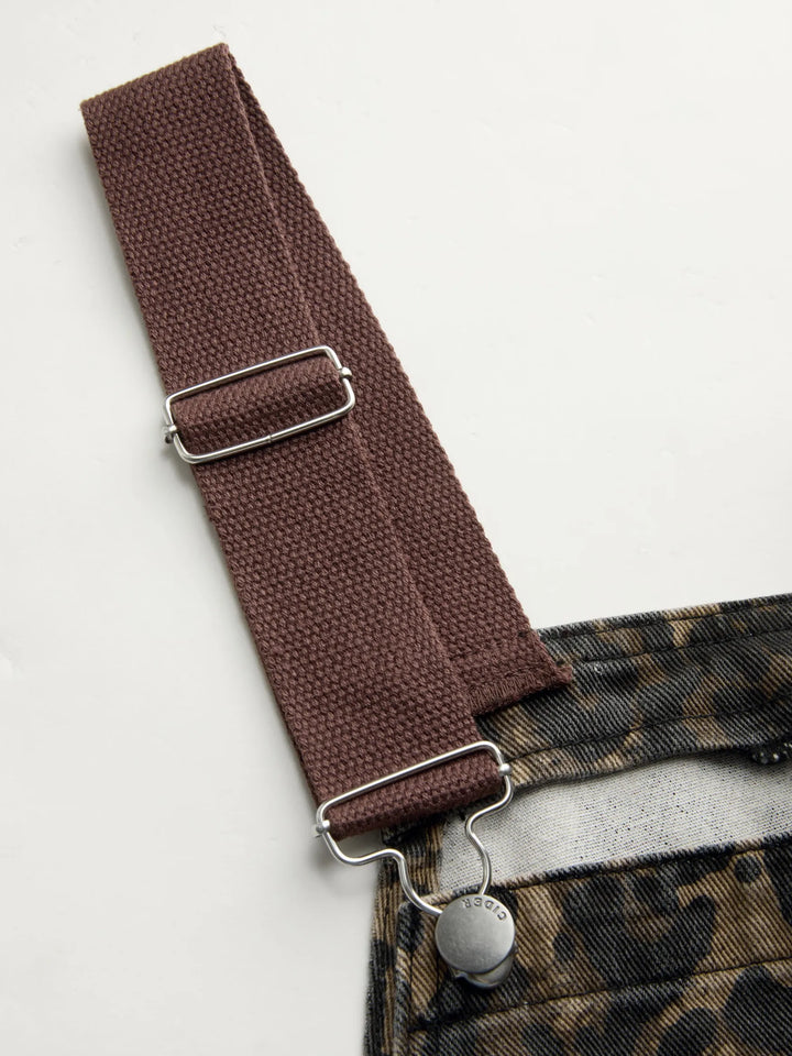 Wide-Leg Denim Jumpsuit with Buckle Closure and Leopard-Print Pocket